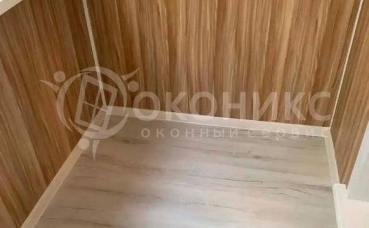 Остекление балкона с отделкой